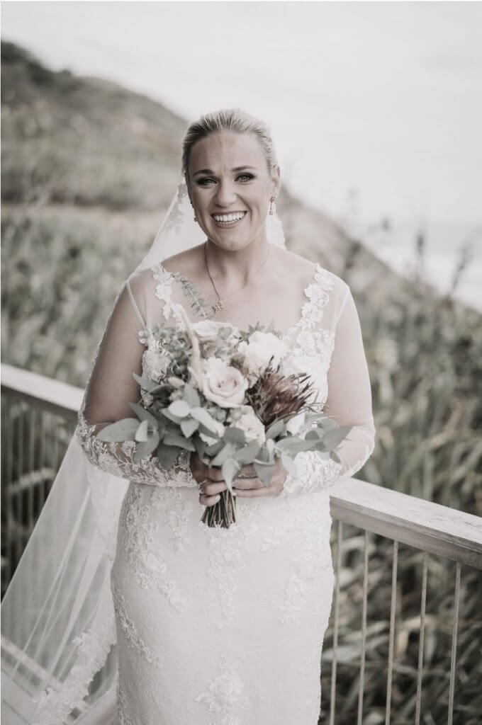 Real Bride Jamielle wearing her Custom Harriett Falvey Wedding Dress and Veil Made in New Zealand